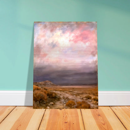 A dreamy desert landscape beneath soft pink and lavender clouds, with golden brush, distant hills, and a tranquil open horizon.