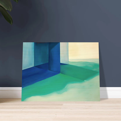 Blue architectural forms meet soft turquoise shores and pale horizons, creating a calm coastal retreat.