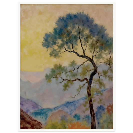 Delicate tree with green-blue foliage standing before pastel mountains under a soft yellow dawn sky.