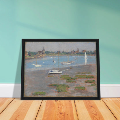 Sailboats rest at low tide near Riverside Yacht Club under hazy blue skies