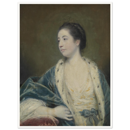 Young woman in a blue robe with fur trim poses against a dark green background