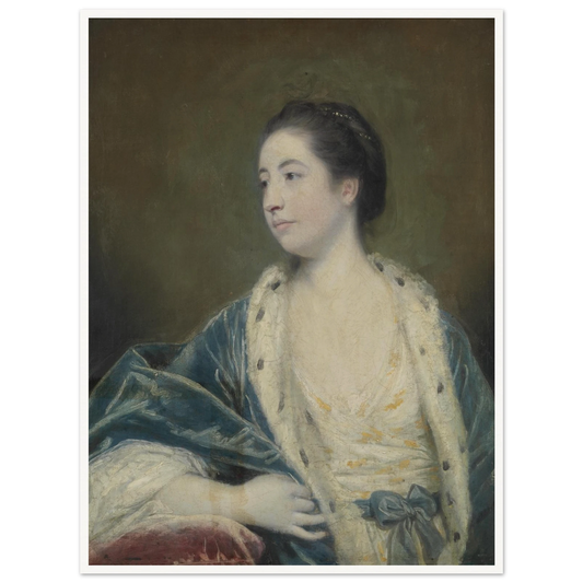 Young woman in a blue robe with fur trim poses against a dark green background