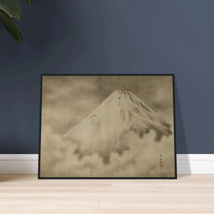 Snow-covered Mount Fuji rises through misty clouds in a soft monochrome Japanese landscape.