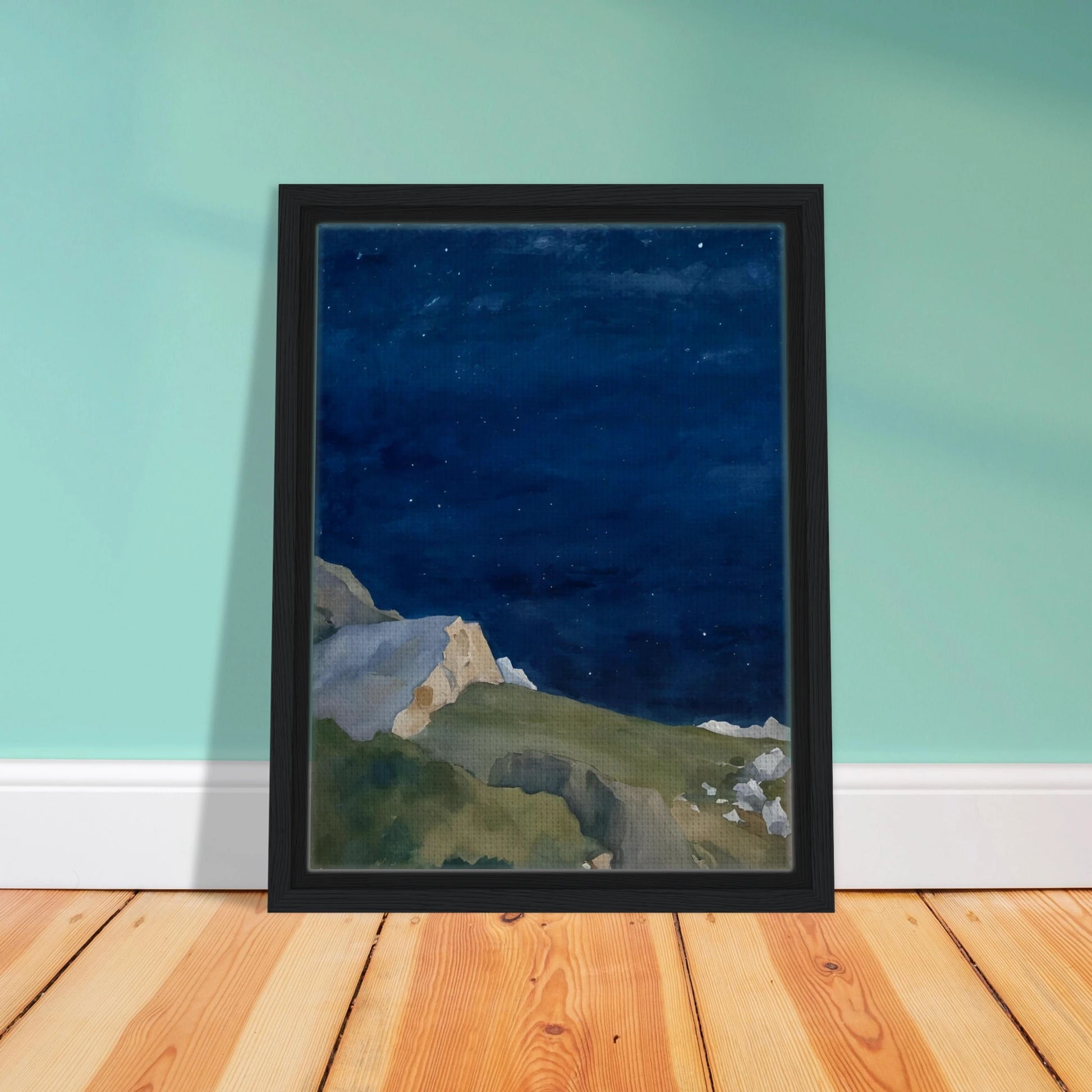A tranquil night scene of rocky cliffs under a starlit indigo sky, evoking solitude and quiet wonder.