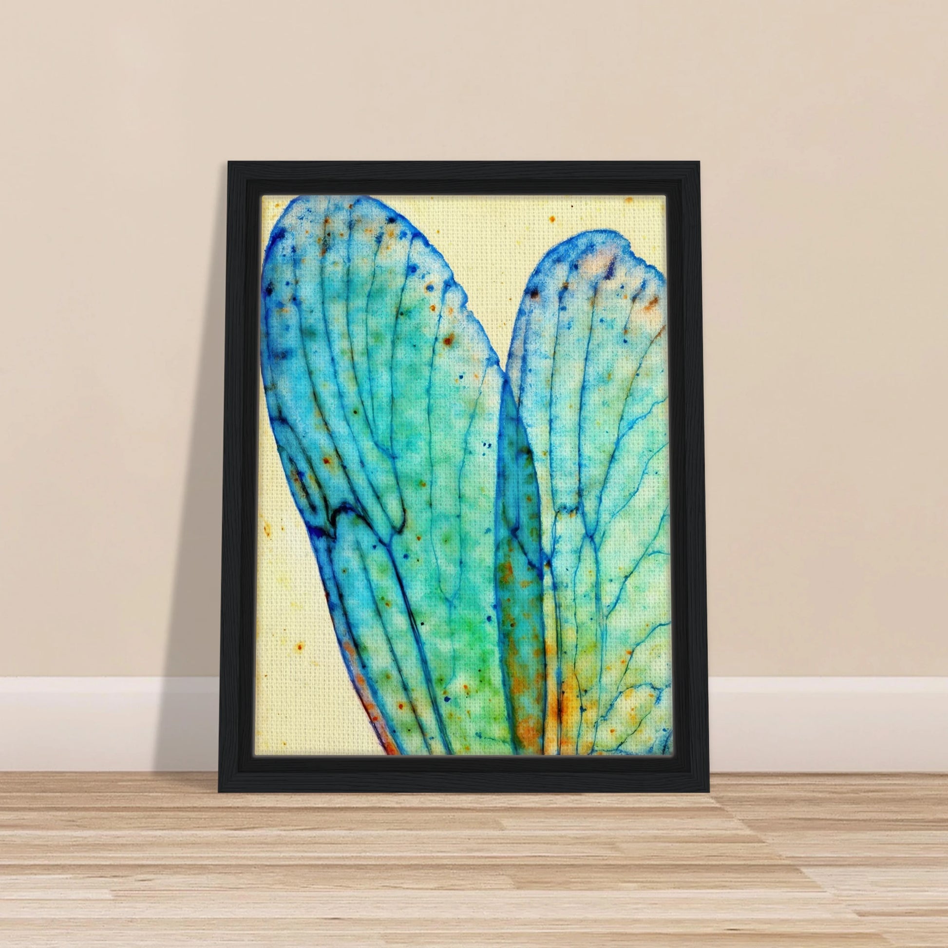 Delicate translucent blue wings with intricate vein patterns, softly glowing against a pale background with watercolor speckles.