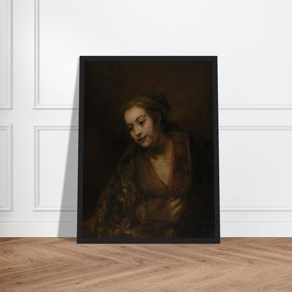 A softly lit woman looks downward while holding her robe against a dark brown background.