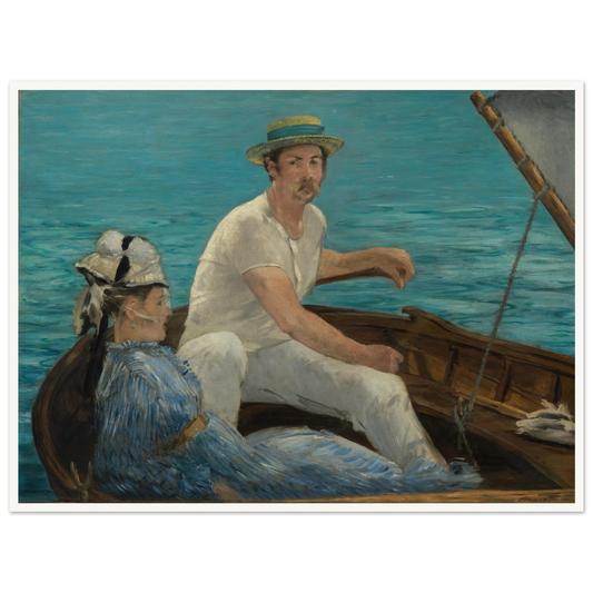 Man and woman sit in a small boat on bright blue water under a gray sail