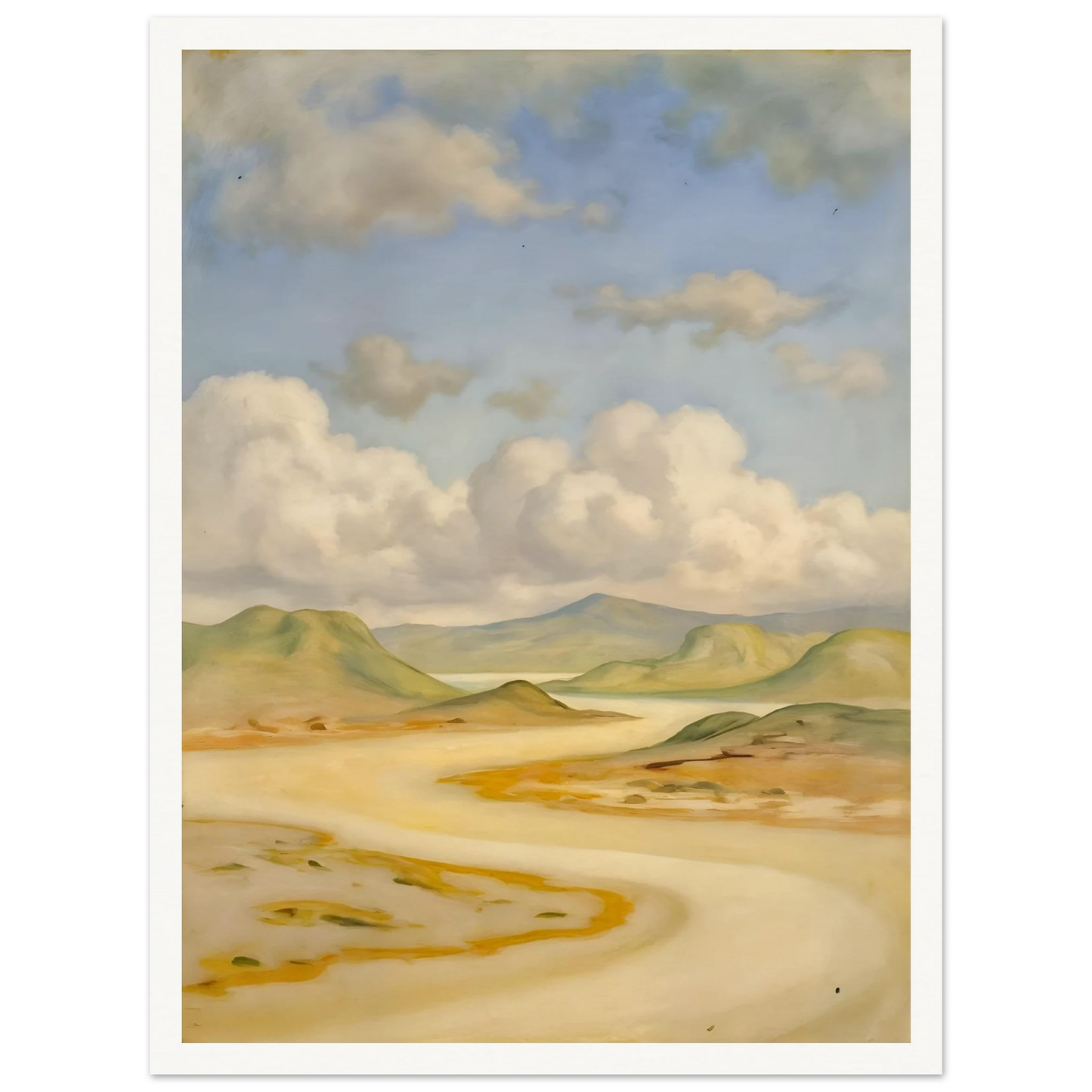 Soft clouds drift above pale hills, sandy curves, and quiet water under a blue sky.