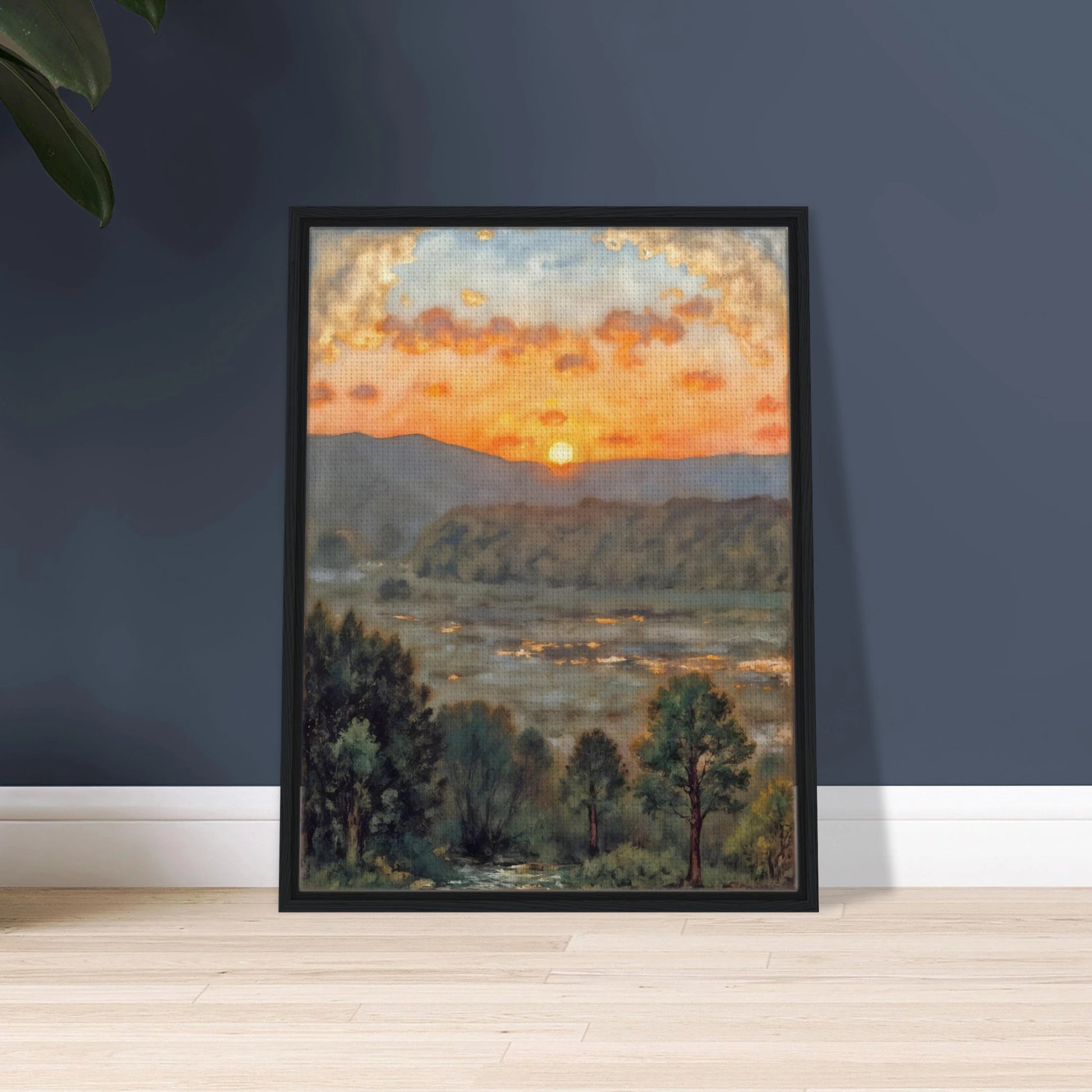 A glowing sunset over misty hills and a river valley, where the sky burns in orange light above soft green trees.